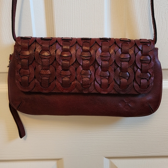 Patricia Nash Handbags - Patricia Nash Baku Leather Crossbody Clutch in Red / Pomegranate color